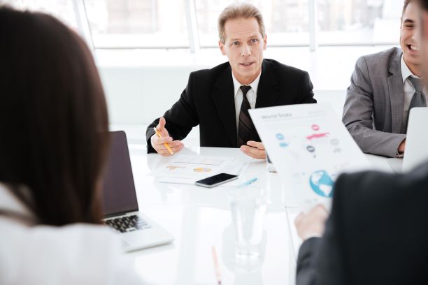 team with multiple generations at a meeting